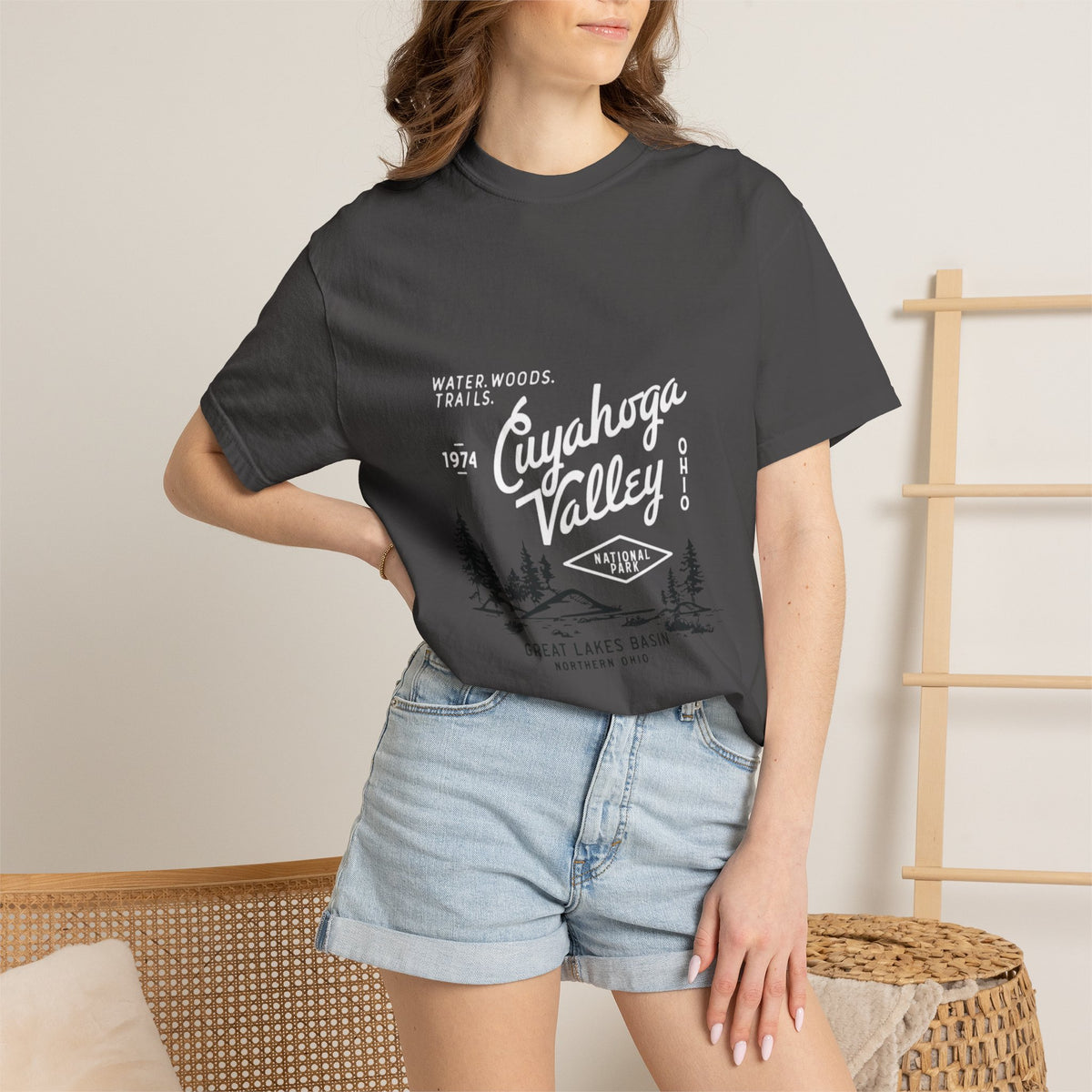 Golden Paw Print Wildlife Graphic Tee